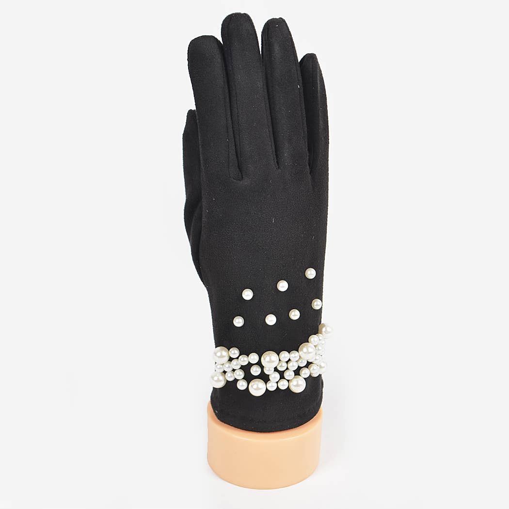 Black glove with pearl embellishments on a white background