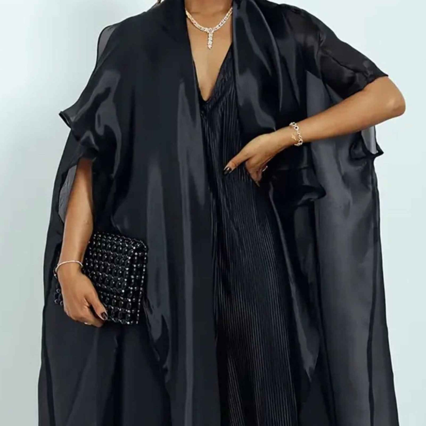Elegant Black Women's Dress with Flowing Cape