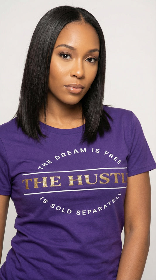 Woman wearing a purple t-shirt with text design on a plain background