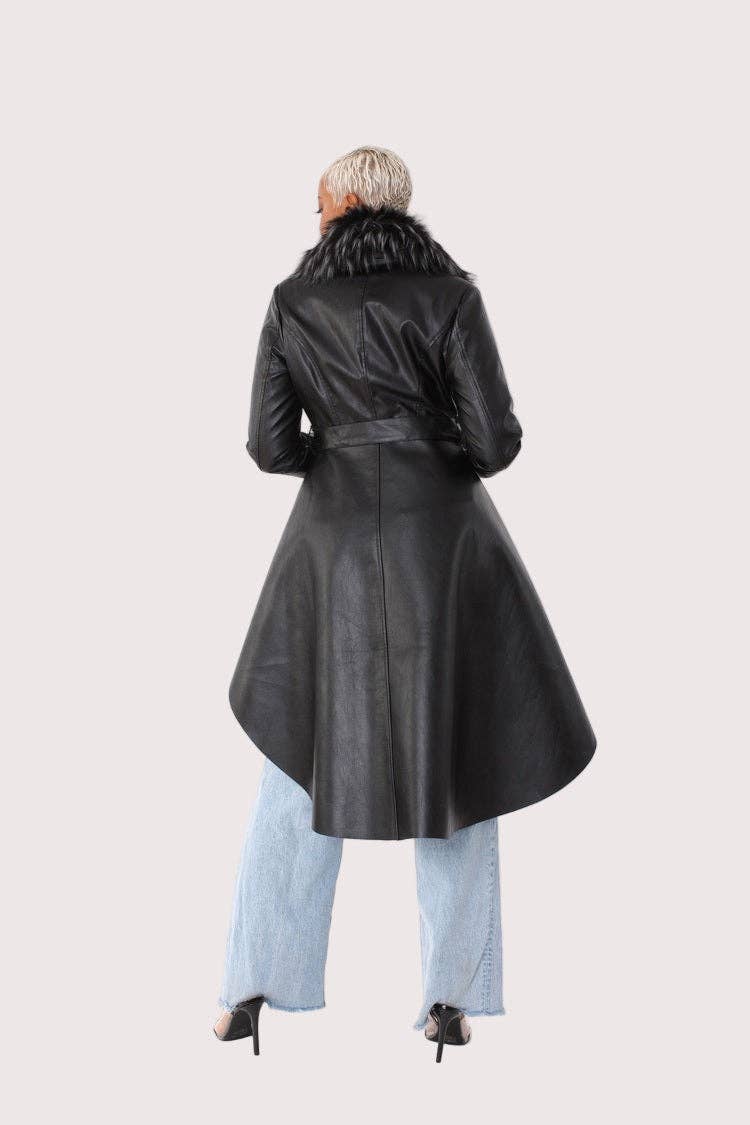 Person wearing a black leather coat with fur collar on a white background
