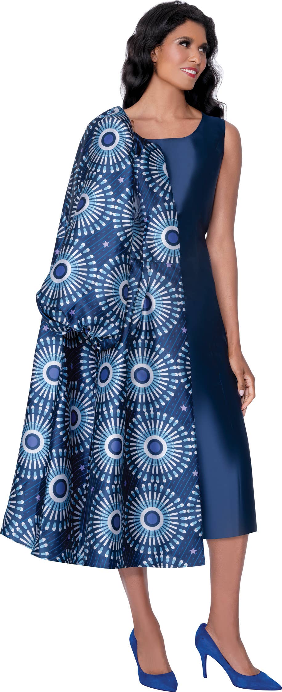 Woman wearing a blue dress with a geometric pattern on a white background