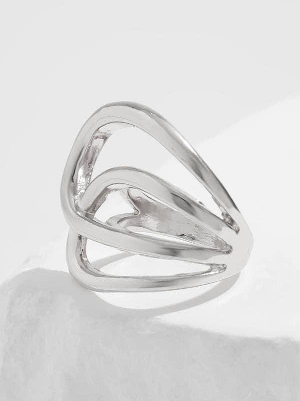 Silver ring with a modern design on a white background