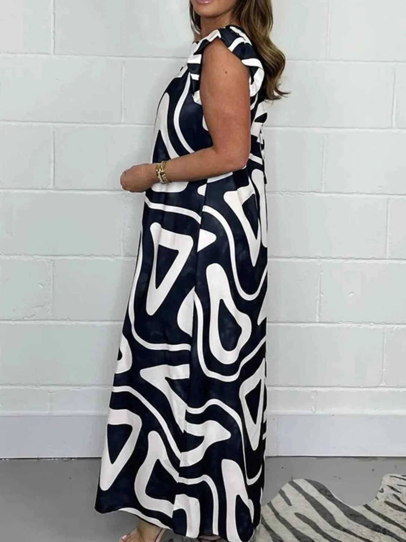 Full Size Printed Wide-Leg Jumpsuit with Flutter Sleeves Plus Size