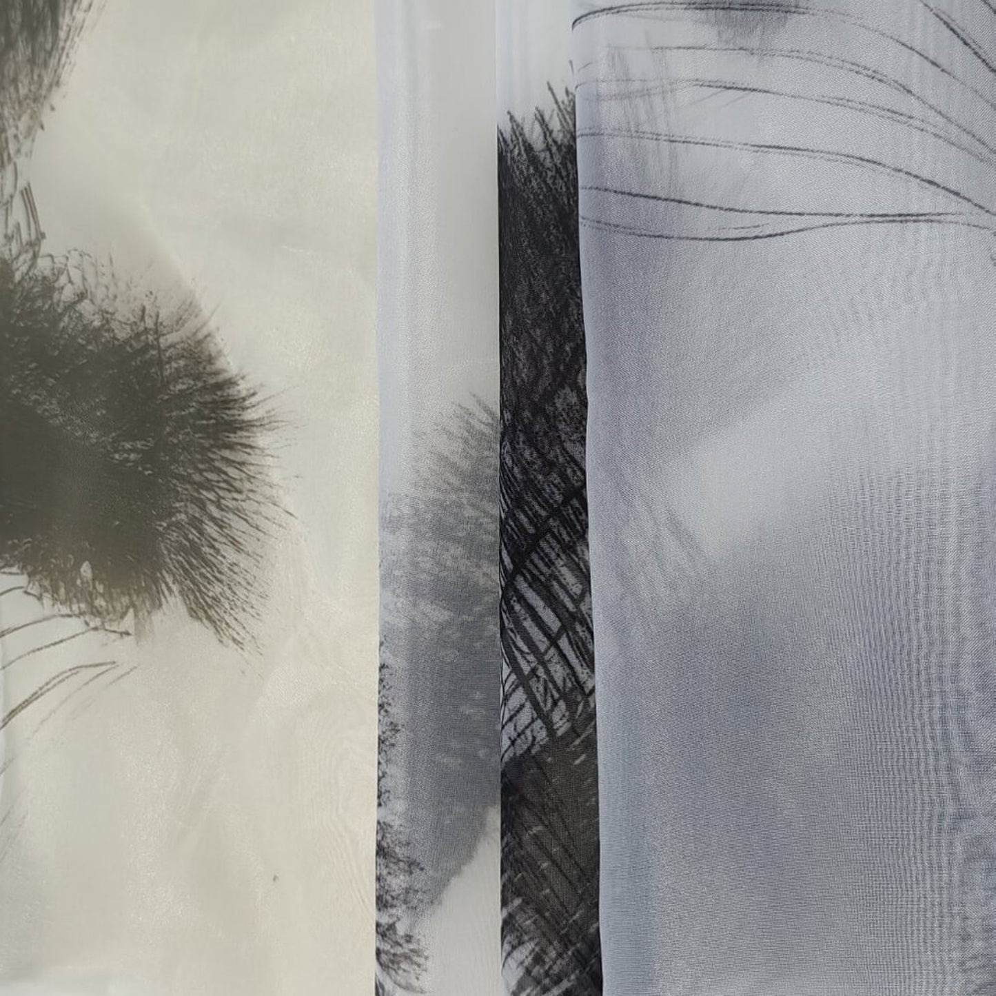 Close-up of fabric with abstract black and white patterns