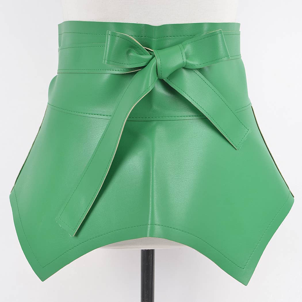 Green leather skirt with a bow on a white background