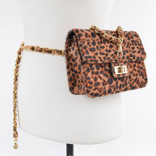 Leopard print handbag with gold chain on a mannequin bust.