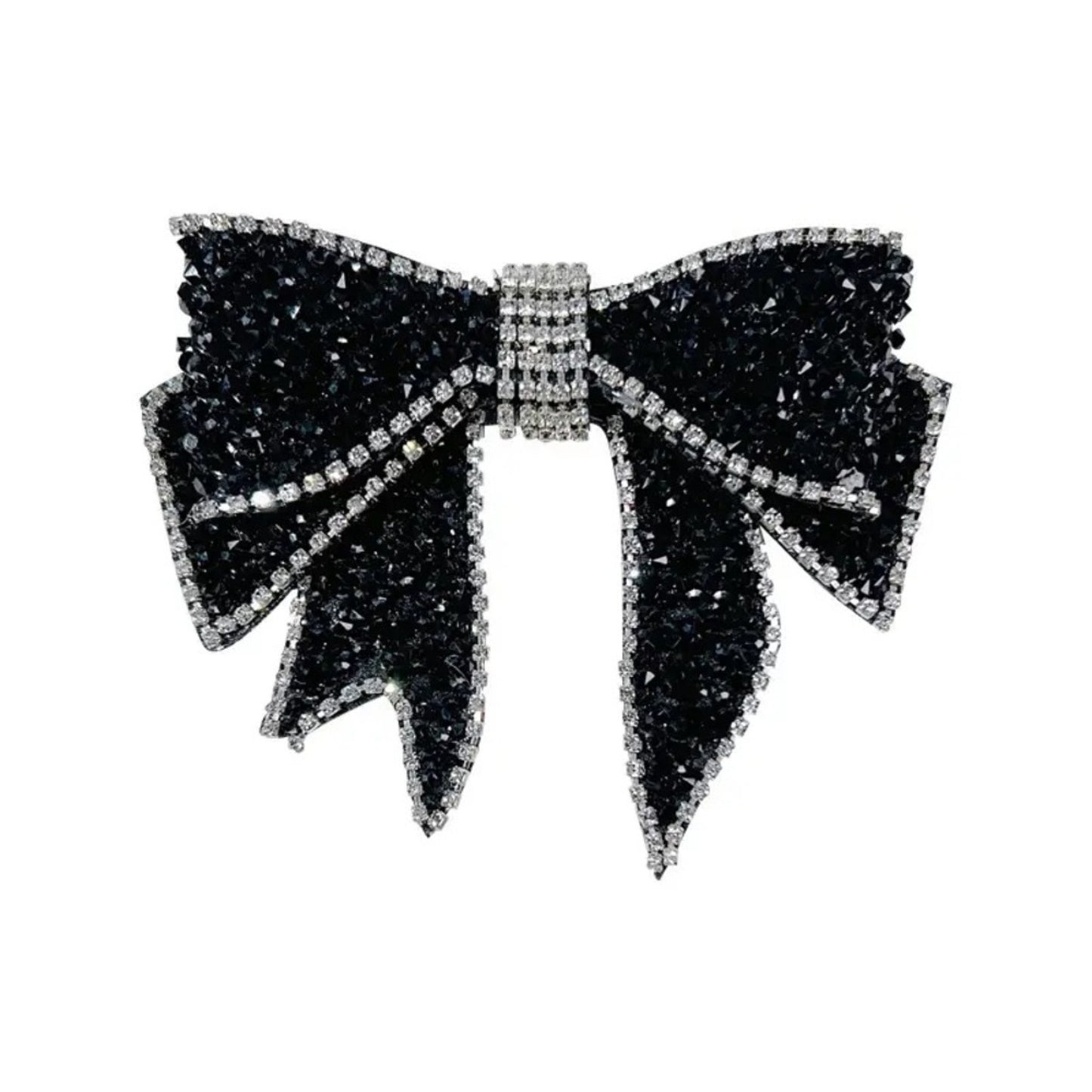 Black bow-shaped brooch with rhinestone details on a white background