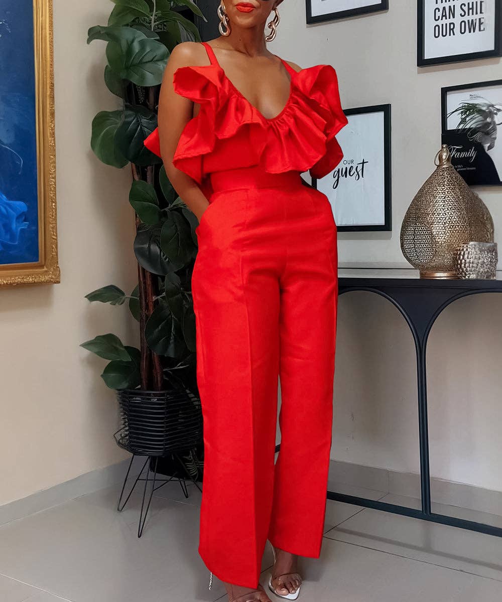 Person wearing a red outfit in an indoor setting with decor elements.