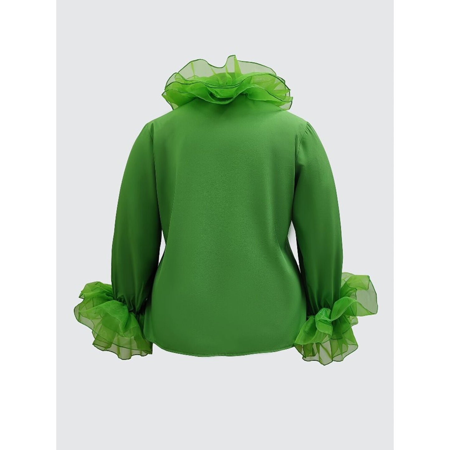 Green dress with ruffled details on a white background