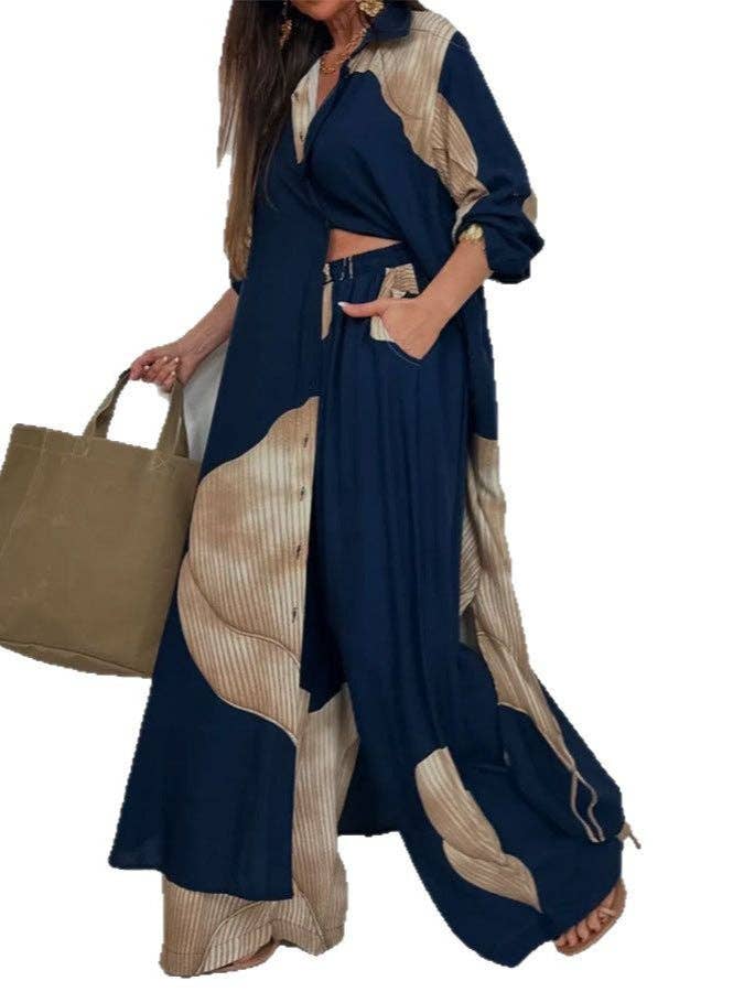 Woman wearing a navy and beige outfit with a beige tote bag on a white background