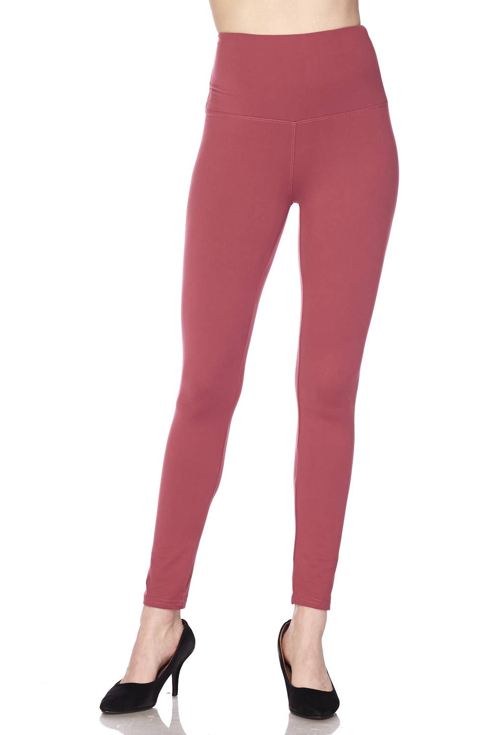 Red leggings worn by a person on a white background