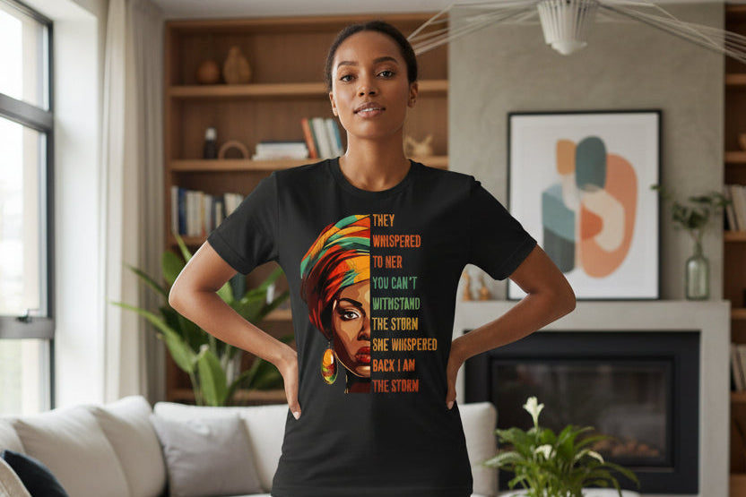 Black t-shirt with a colorful design of a woman's face and motivational quote.