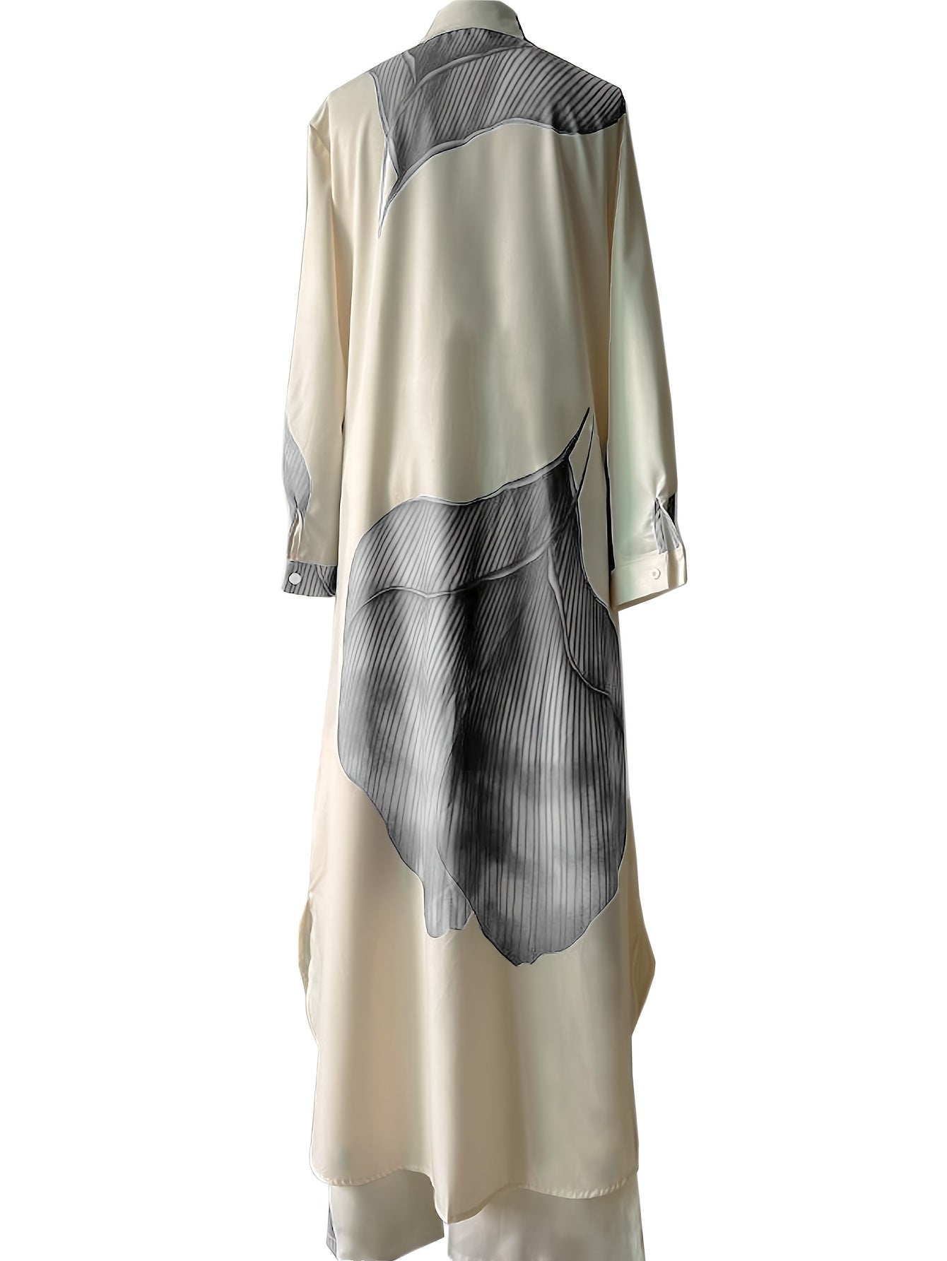 Beige dress with black abstract pattern on a white background