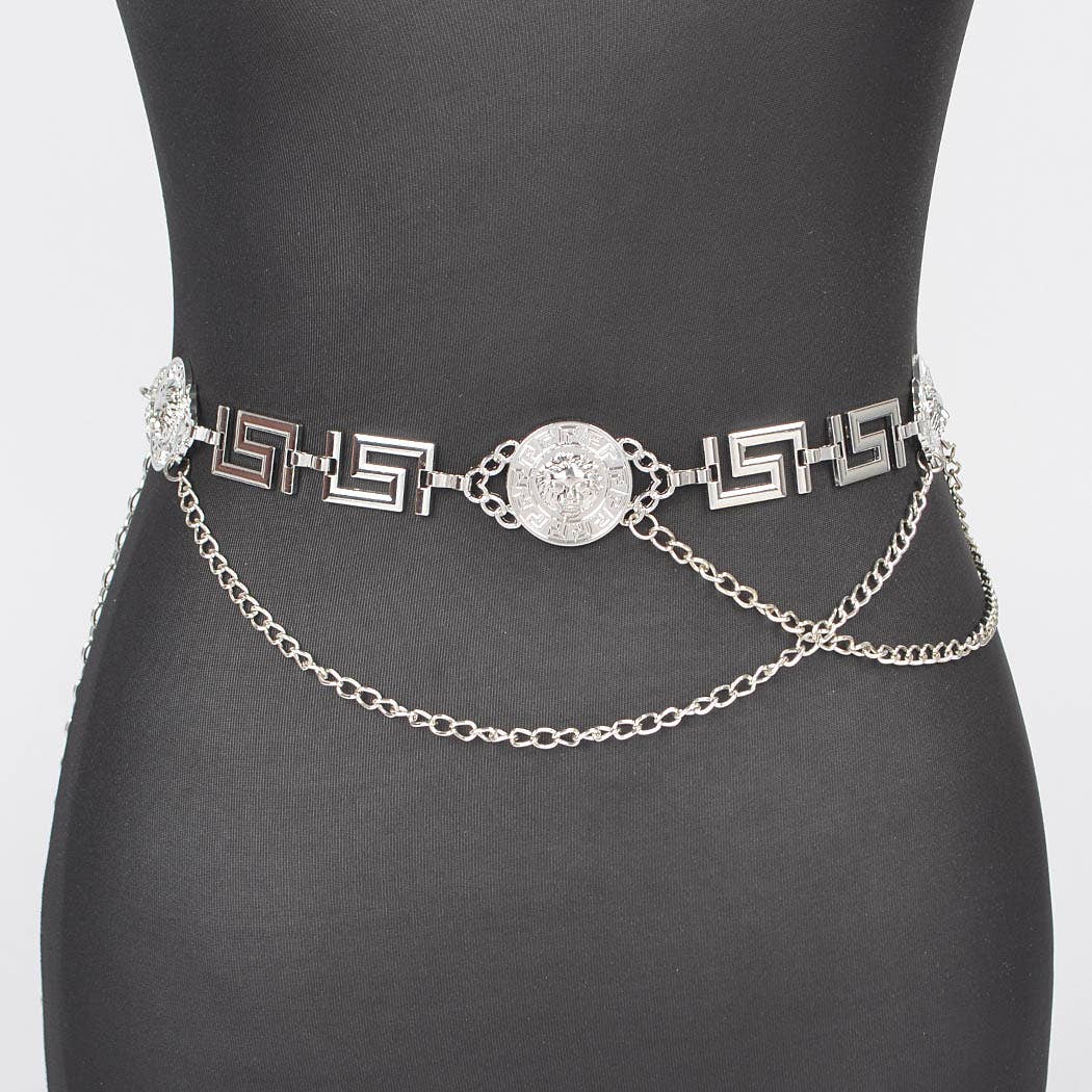 Silver chain belt with decorative elements on a black background