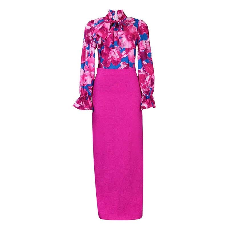 Pink floral blouse with a matching pink skirt on a white background