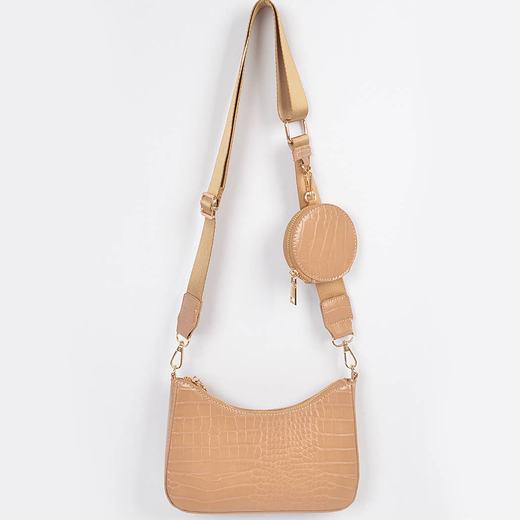Beige handbag with a matching round pouch on a white background