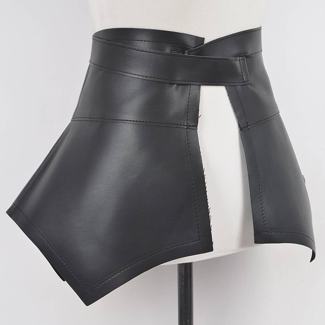 Black leather skirt on a mannequin against a white background