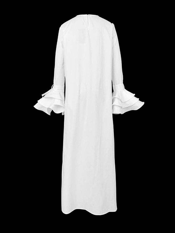 White dress with ruffled sleeves on a black background