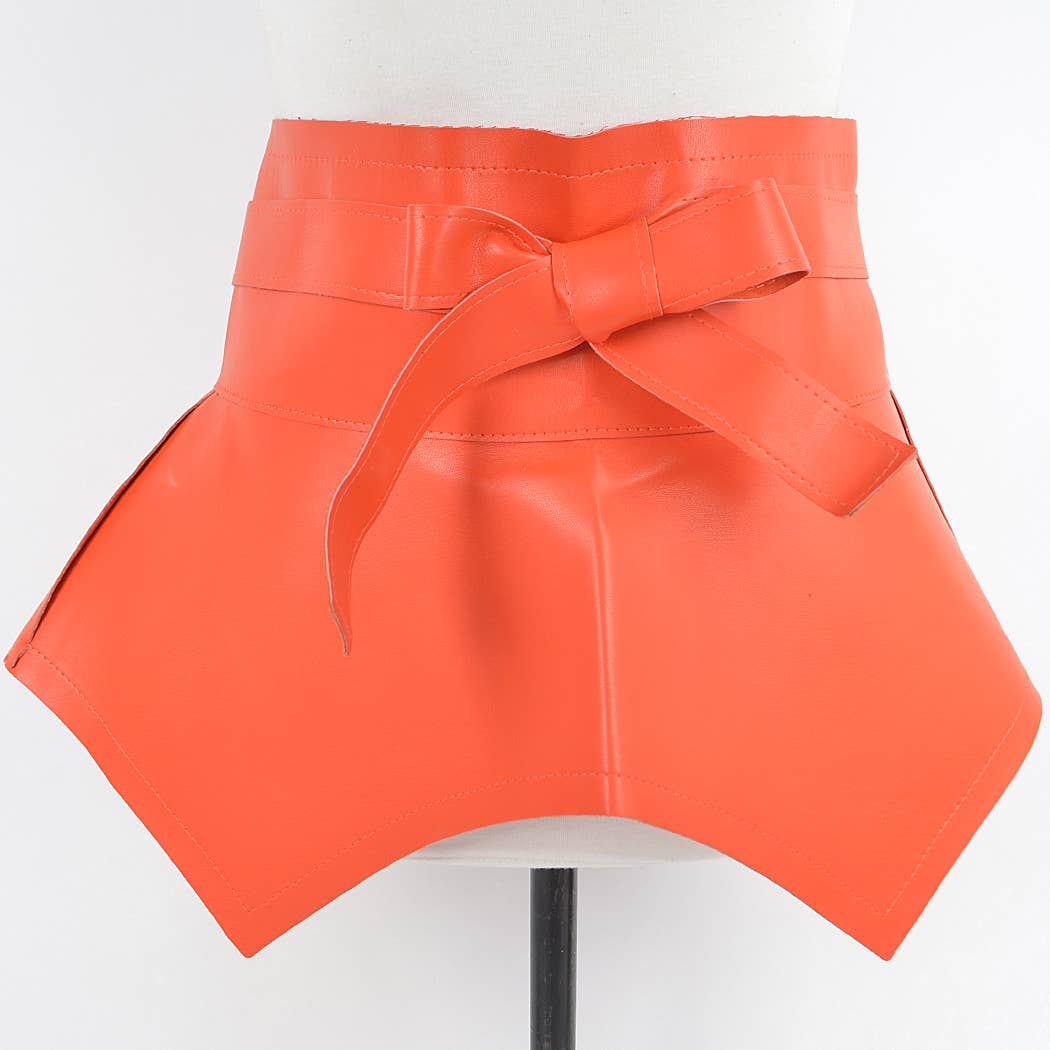 Orange apron with a large bow on a white background