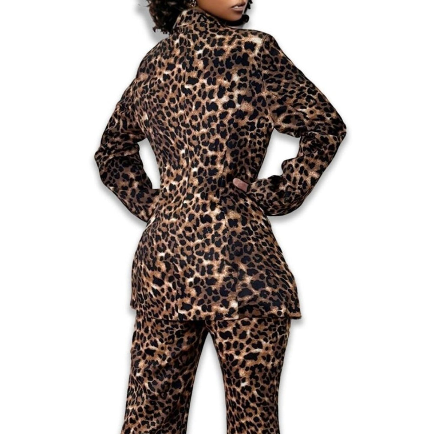 Person wearing a leopard print outfit on a white background