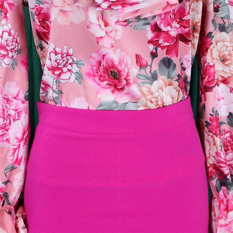 Close-up of a pink floral fabric with a solid pink panel