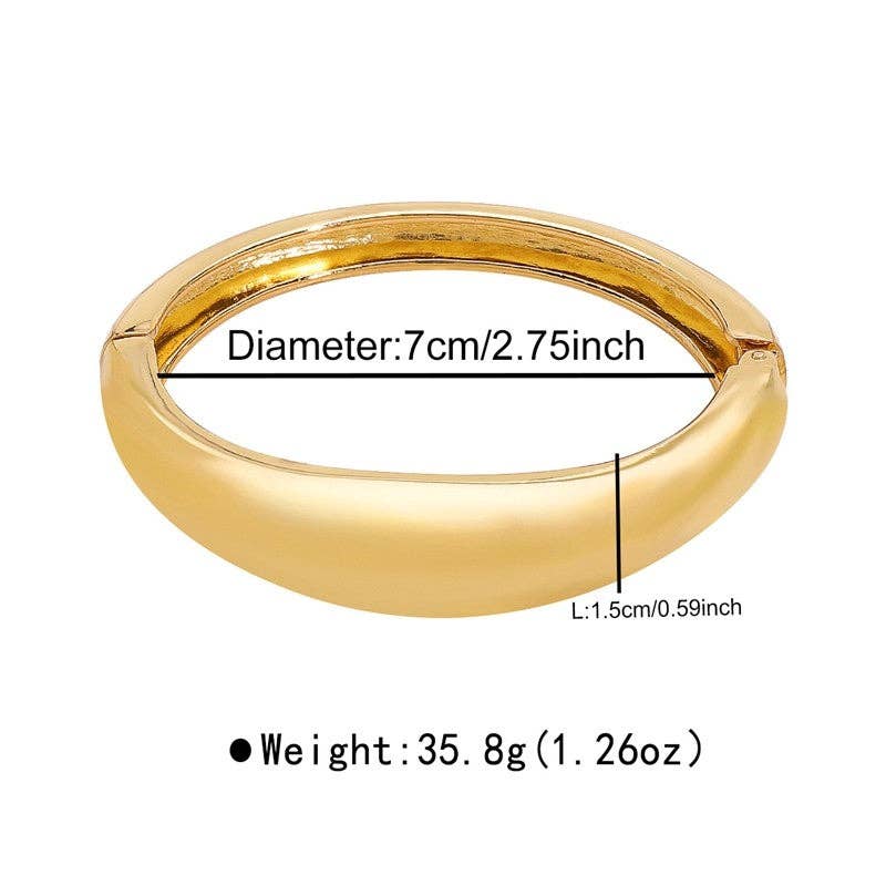 Gold ring with measurements on a white background