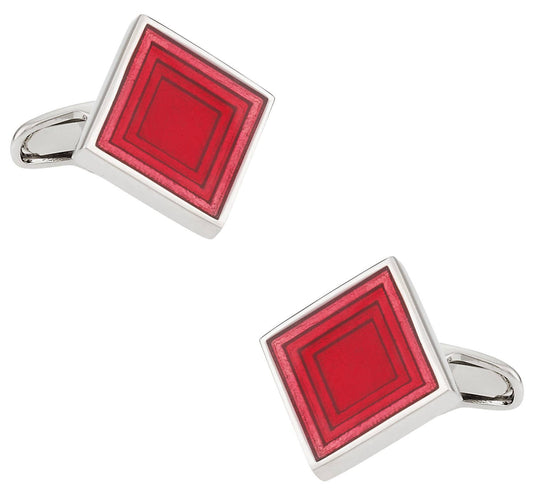 Red square cufflinks with silver borders on a white background