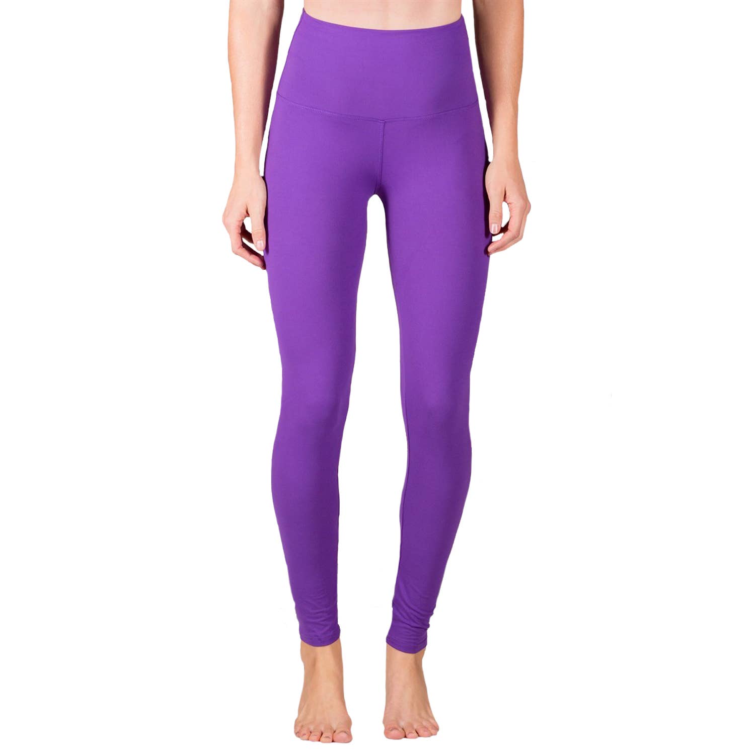 Purple leggings worn by a person on a white background