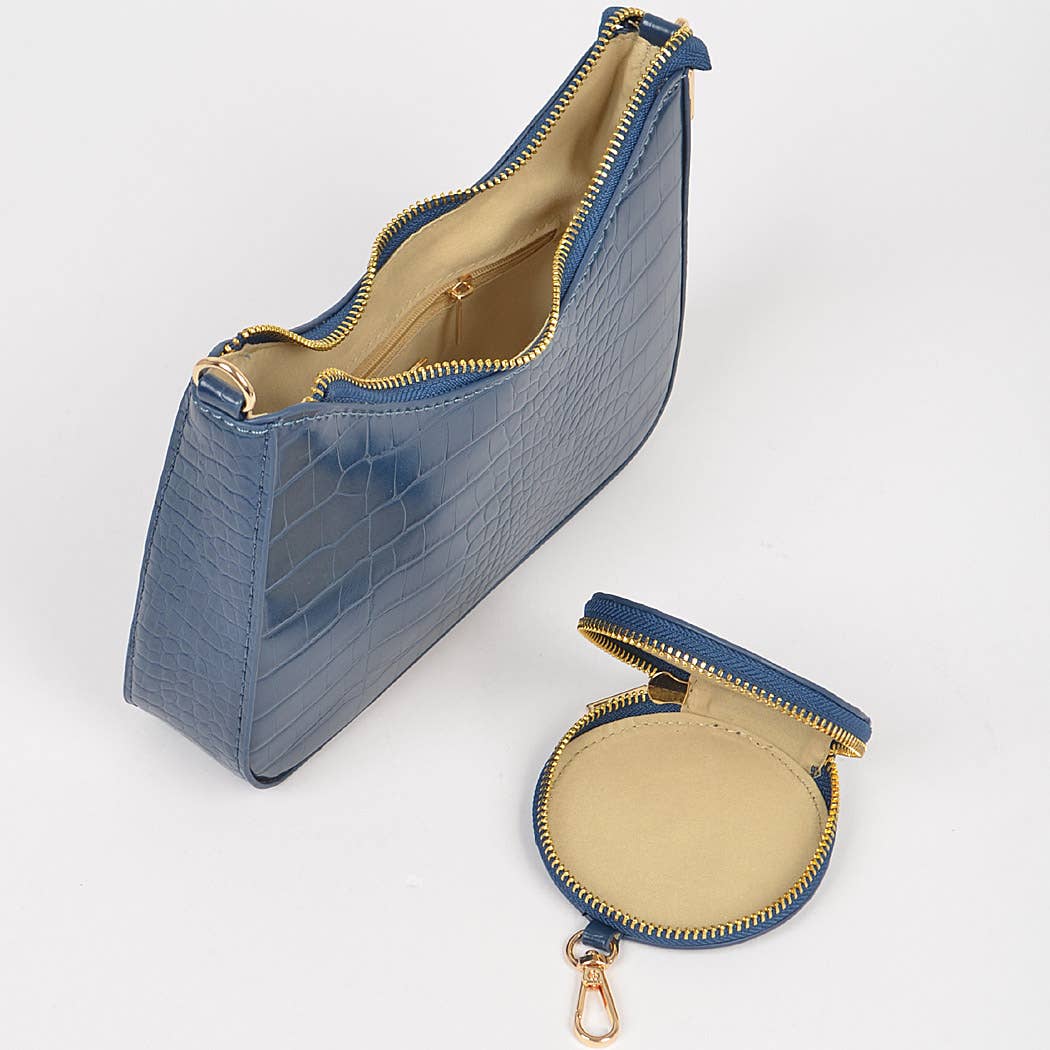 Blue crocodile-patterned pouch with a smaller round pouch on a white background