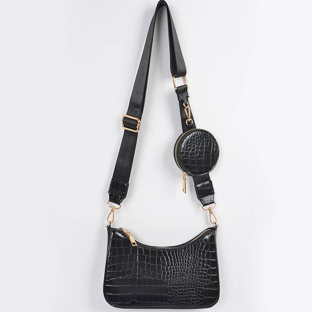 Black crocodile-patterned handbag with a matching round pouch on a light gray background
