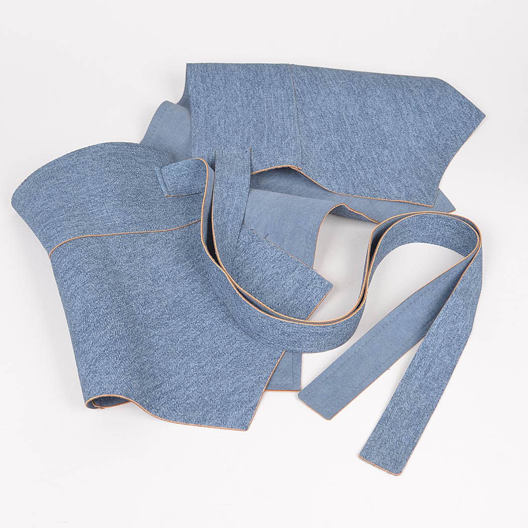 Blue denim fabric with a white background