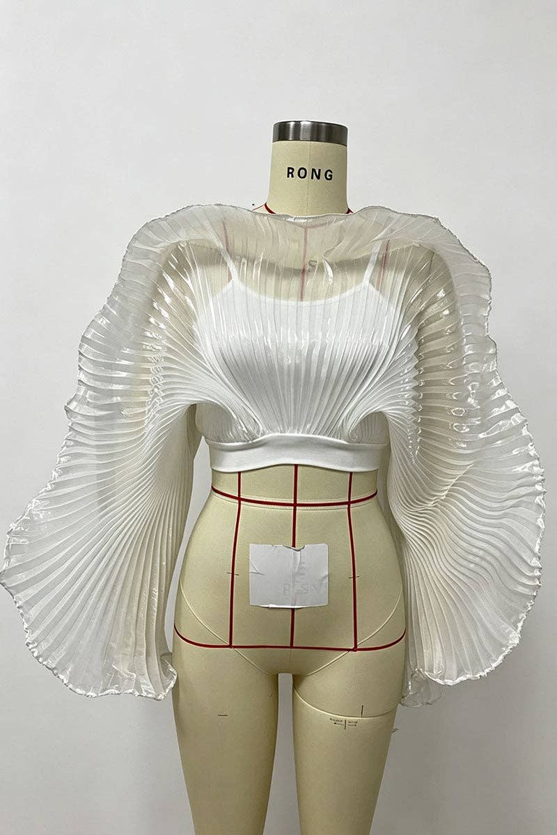 A white pleated sheer cropped top with dramatic wide sleeves displayed on a beige mannequin torso against a plain light background.