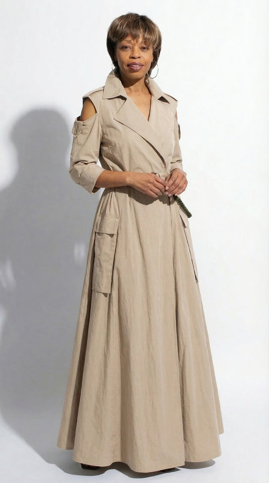 Woman wearing a long beige trench coat on a white background