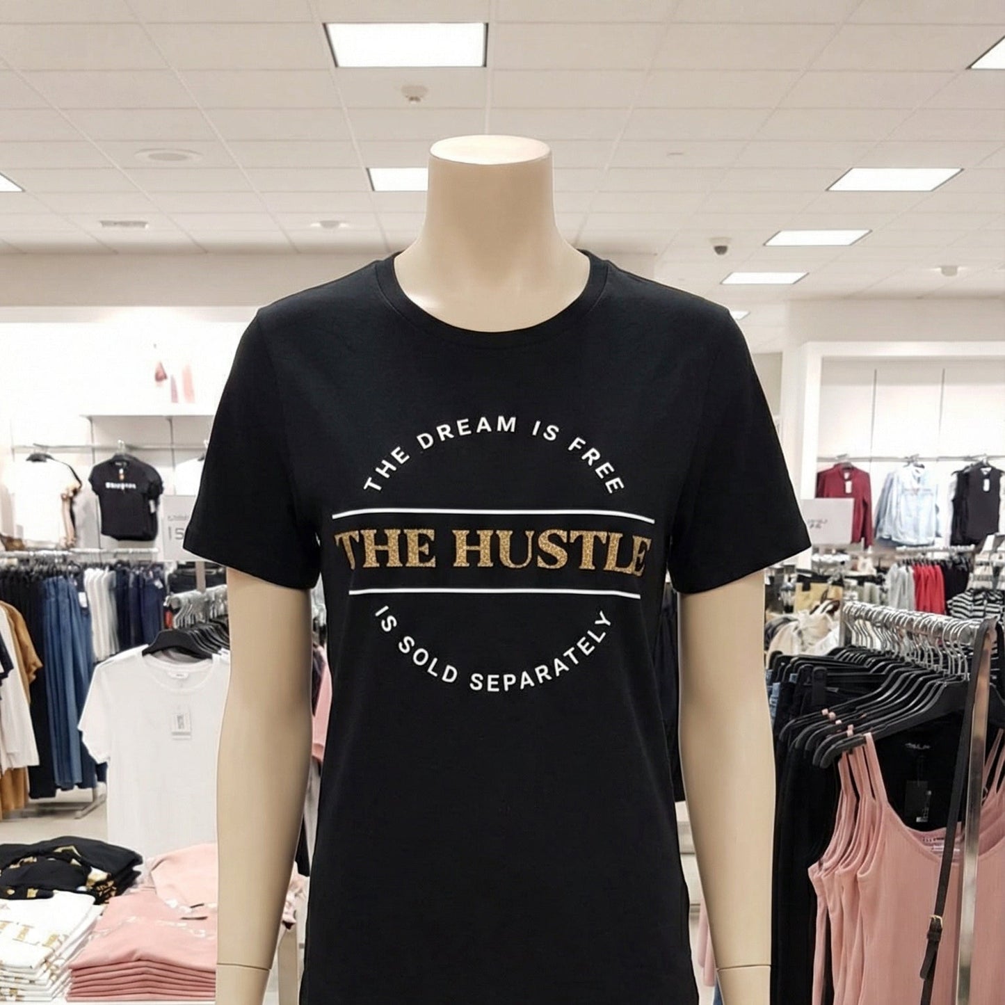 Mannequin wearing a black t-shirt with text in a store setting