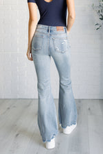 Load image into Gallery viewer, Caroline Mid Rise Control Top Distressed Flare Jeans
