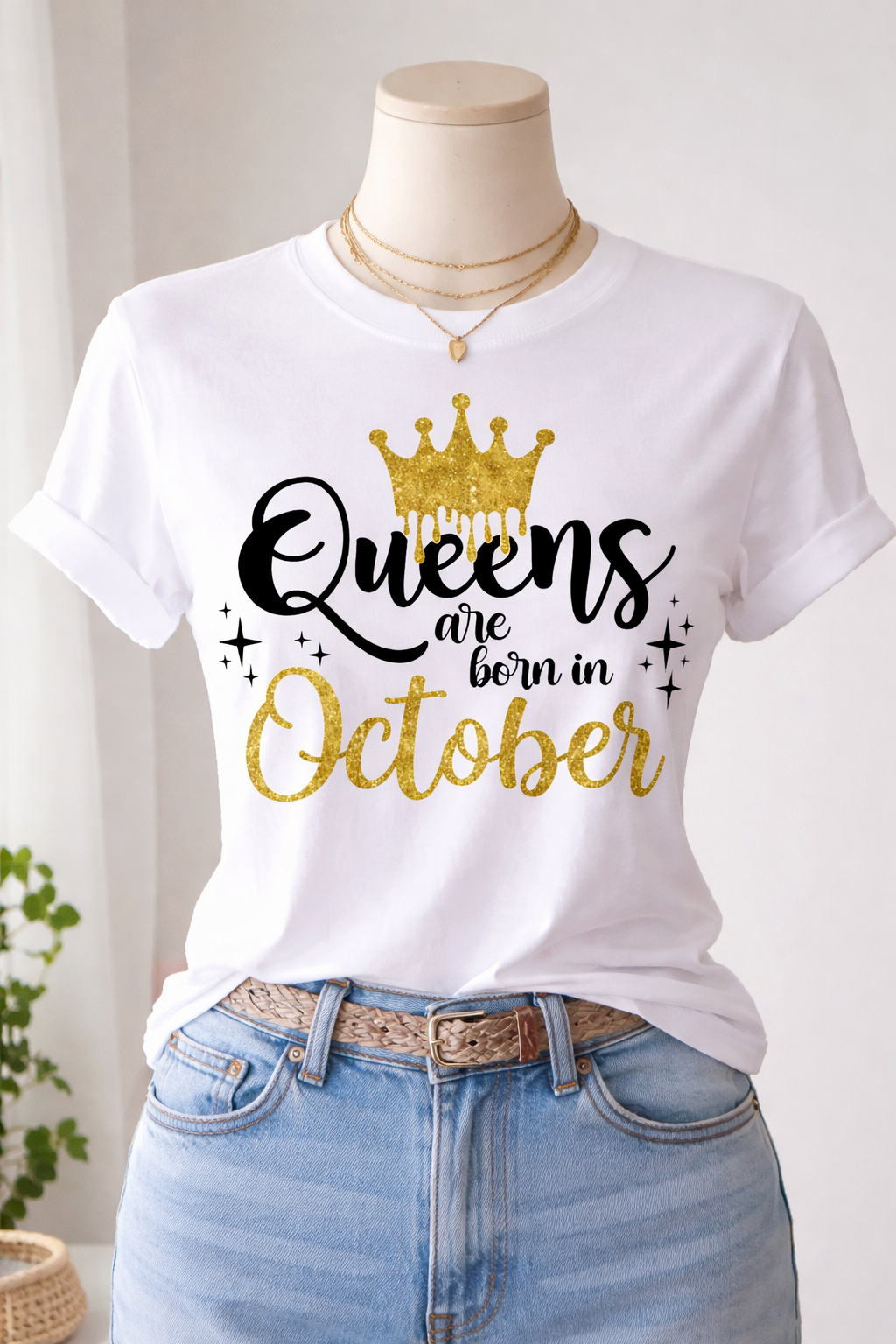White t-shirt with 'Queens are born in October' text on a mannequin with jeans.