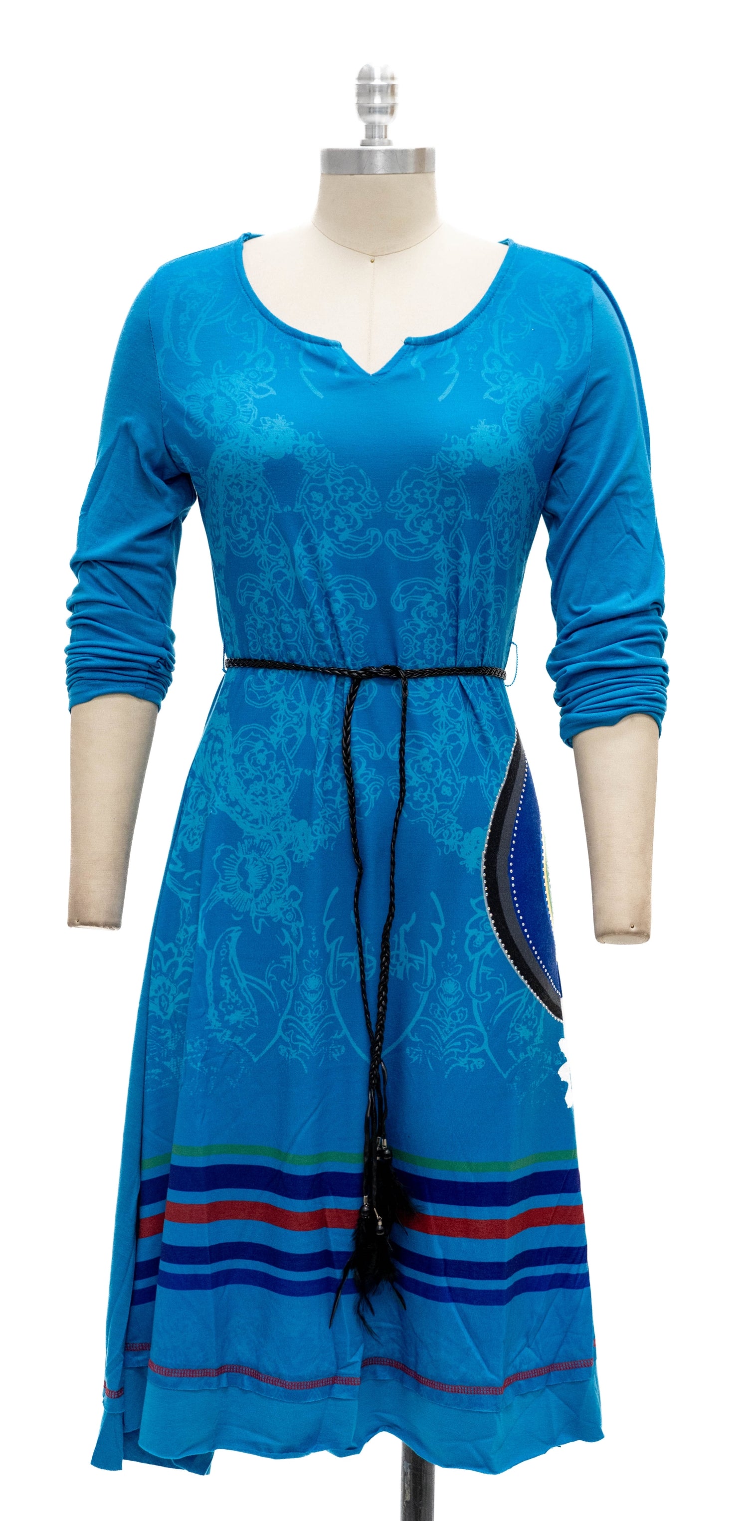 Blue dress with a striped pattern on a mannequin against a white background