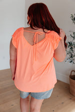 Load image into Gallery viewer, Ruched Cap Sleeve Top in Neon Orange
