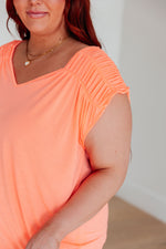 Load image into Gallery viewer, Ruched Cap Sleeve Top in Neon Orange
