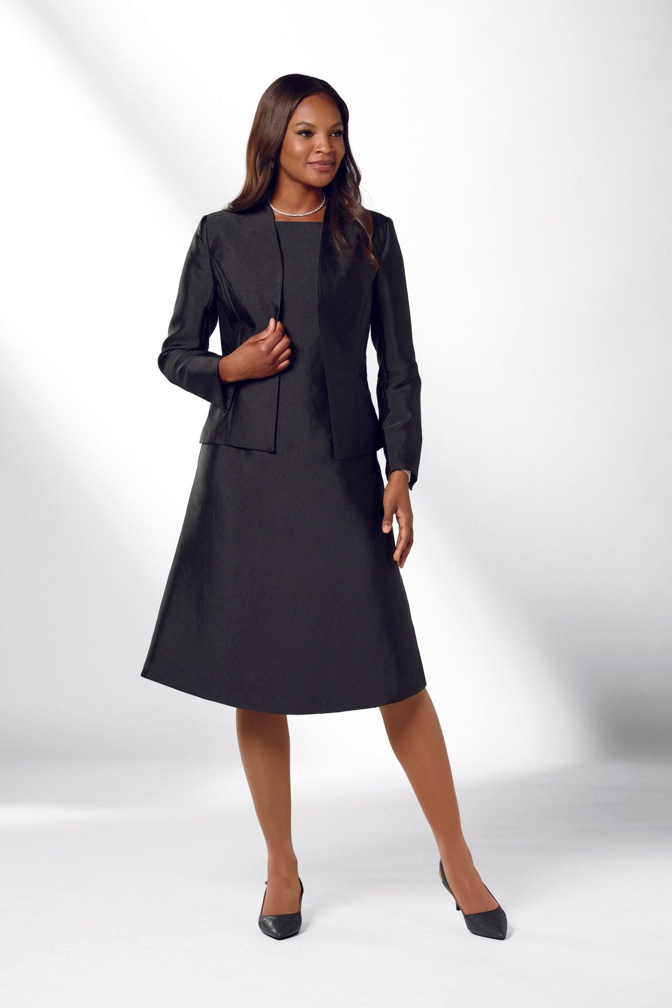 Black Jacket Dress - Side Profile Showing Tailored Fit and Structure
