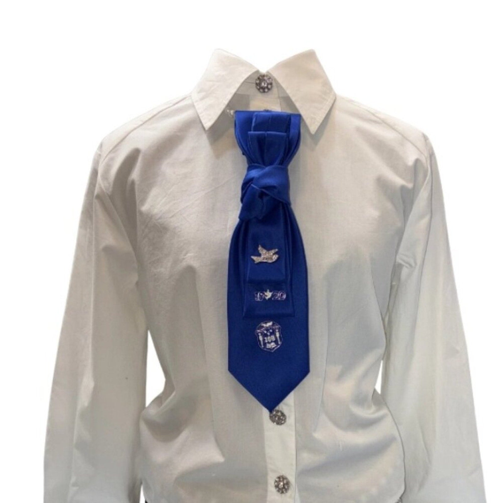 White shirt with a blue tie featuring a logo on a white background