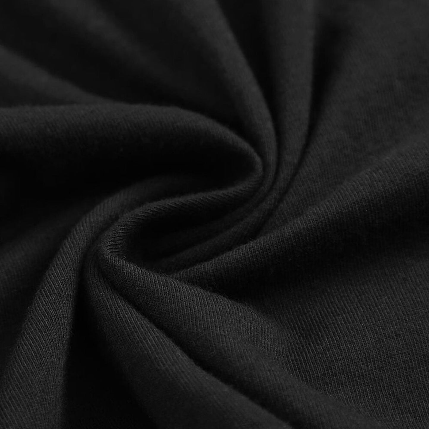 Close-up of black fabric with folds