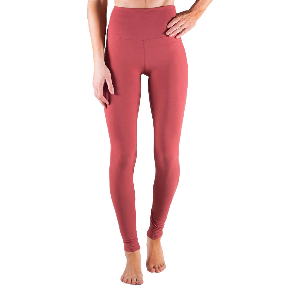 Red leggings worn by a person on a white background