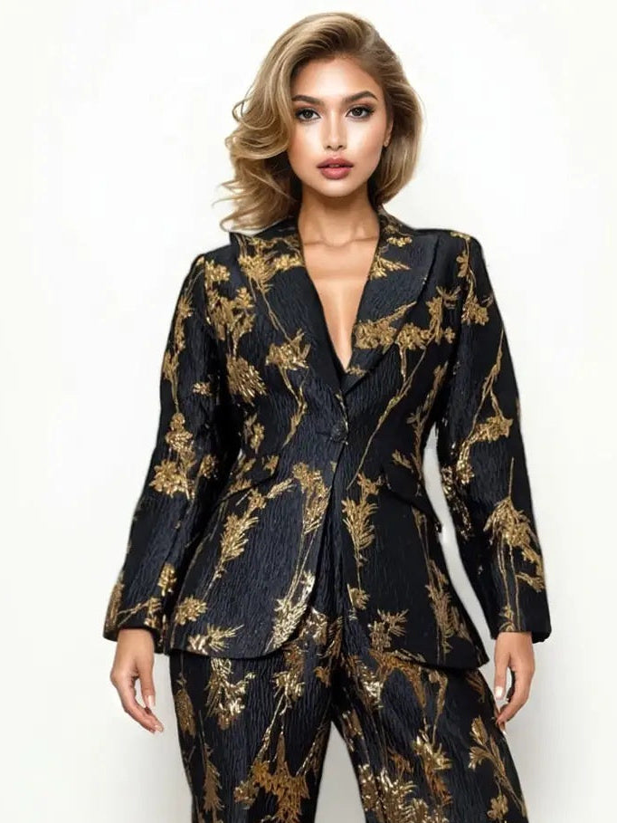 Woman wearing a black and gold patterned suit on a white background