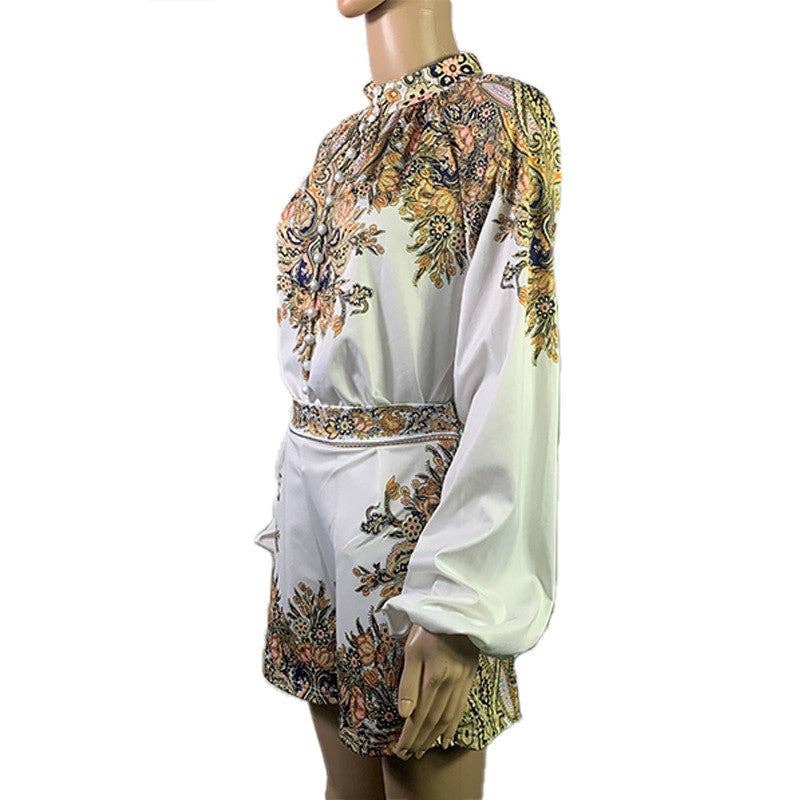 Mannequin wearing a white dress with floral patterns on a white background
