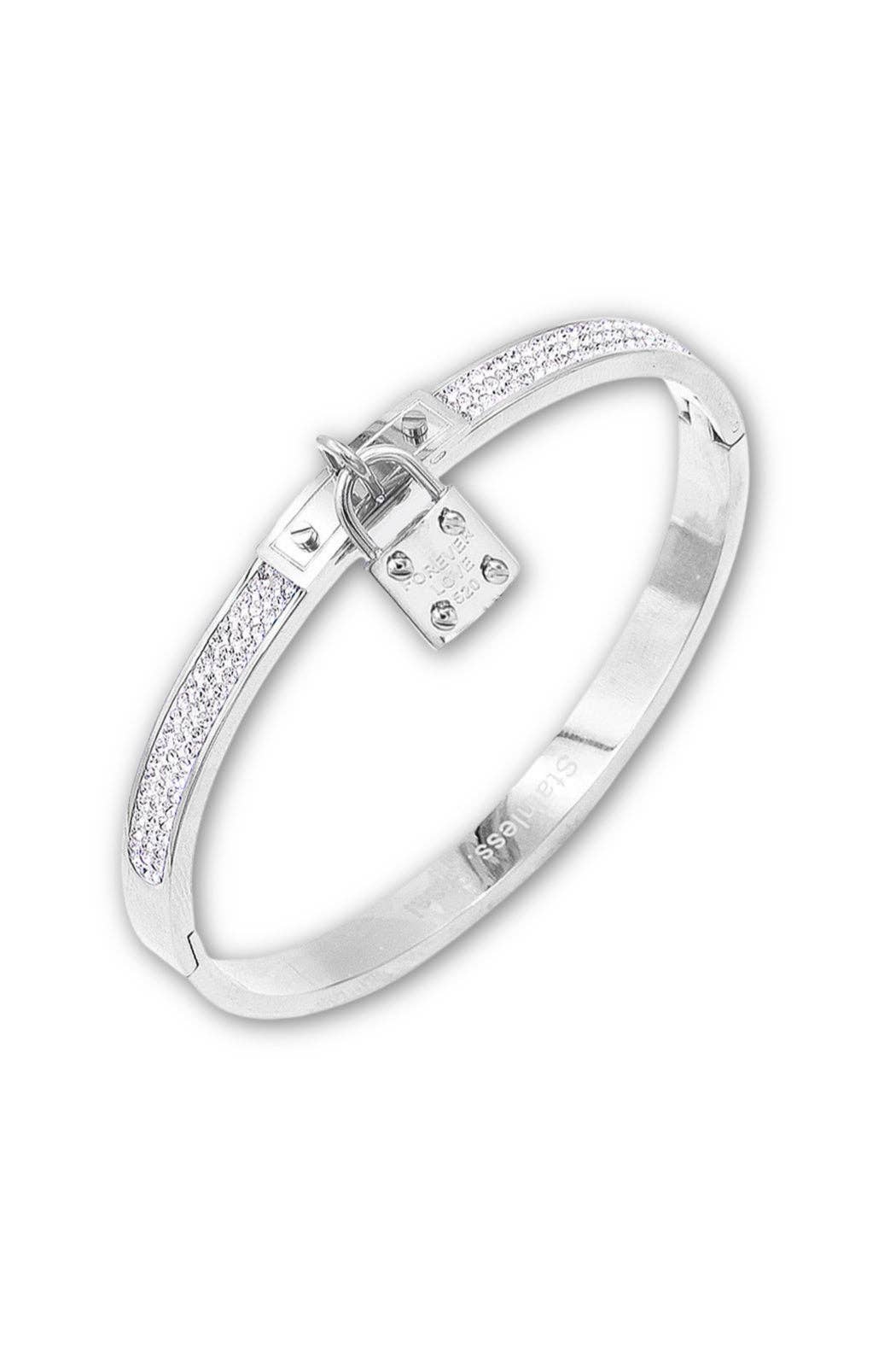 Silver bracelet with small diamonds on a white background