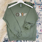 Load image into Gallery viewer, Easter Symbols Embroidered Sweatshirt
