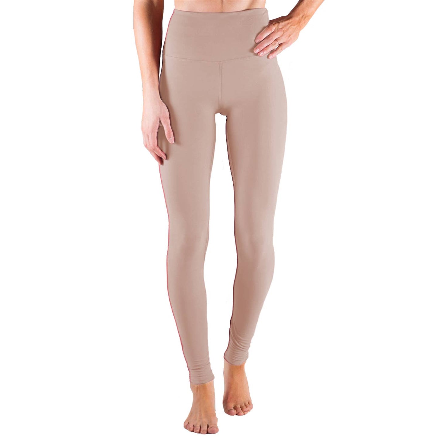 Beige leggings worn by a person on a white background