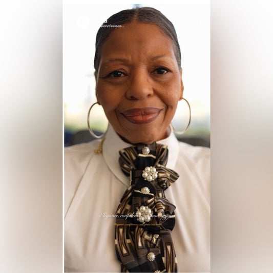 Woman wearing a decorative scarf with a blurred background