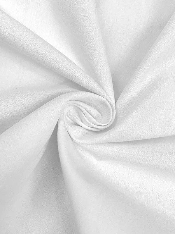 Close-up of white fabric with folds